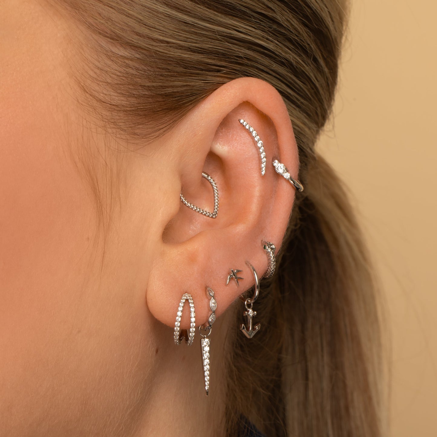 Laura Bond Jewellery 14k solid white gold Aurora curved flat back labret stud earring Cartilage Studs