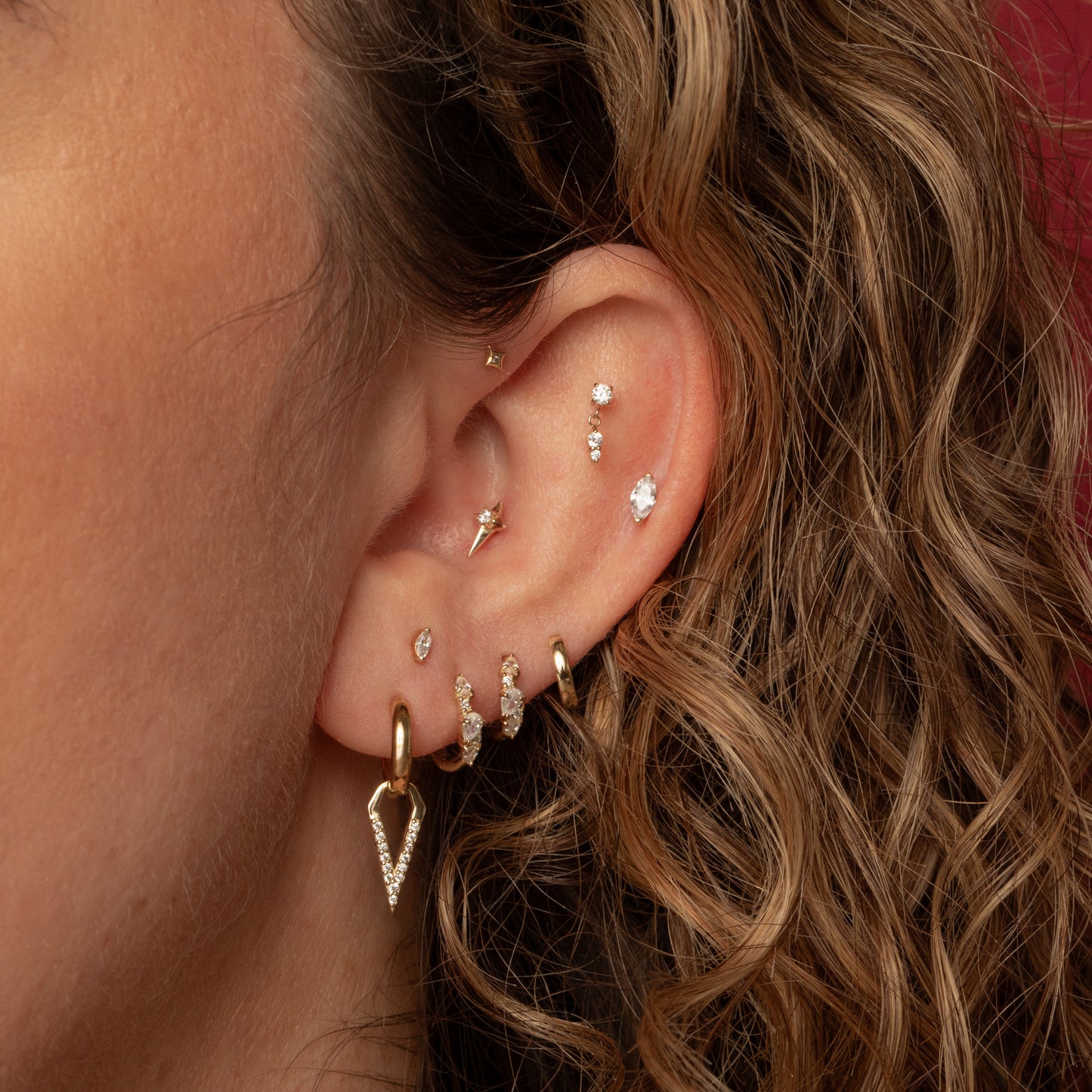 Laura Bond Jewellery 14k solid yellow gold Eclipta star flat back labret stud earring Cartilage Studs