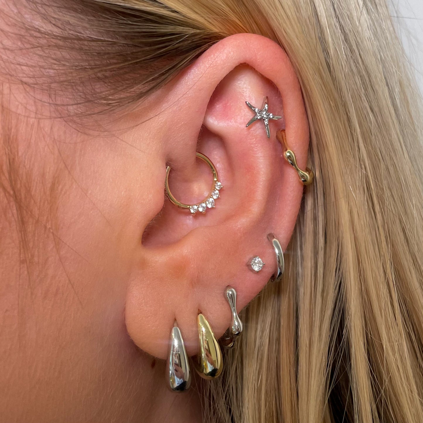 14k solid yellow gold Tiara clicker hoop for daith or septum Huggies and Hoops Laura Bond Jewellery