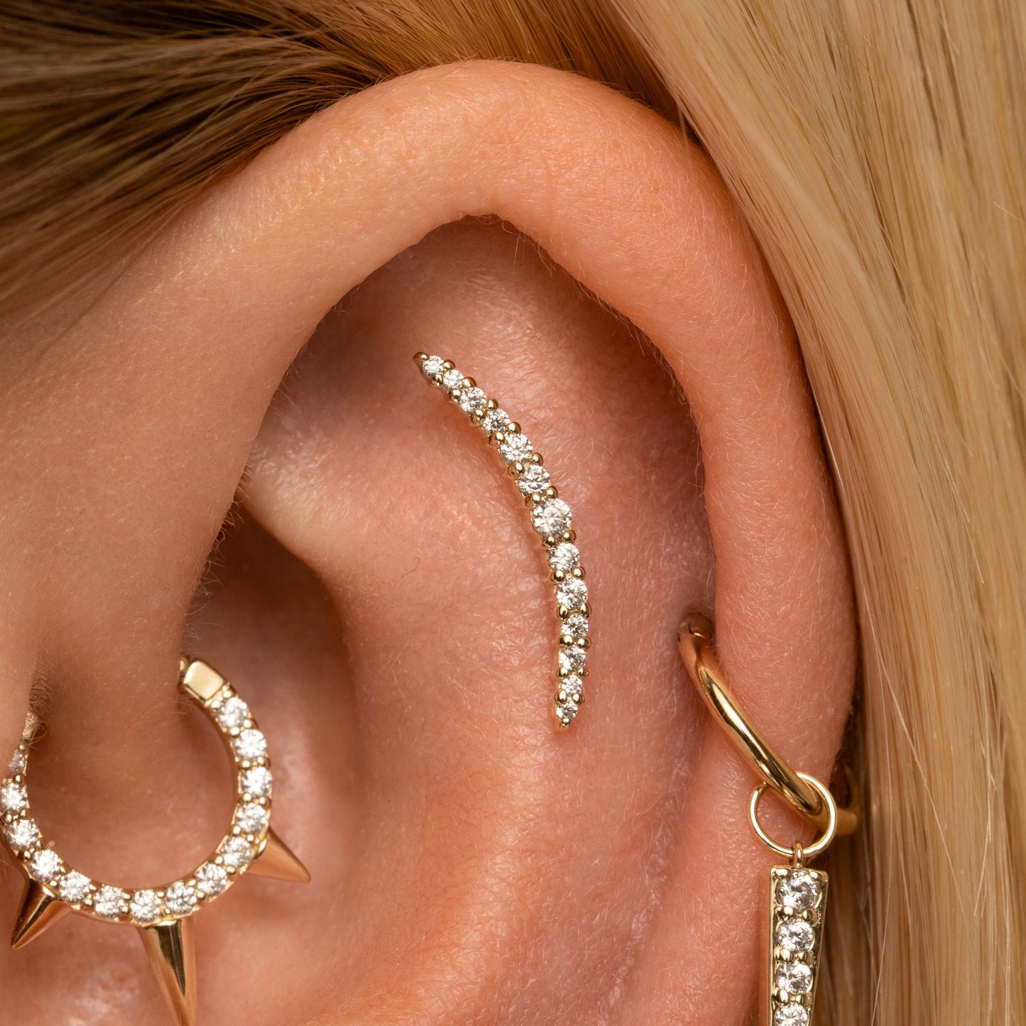 Laura Bond Jewellery 9k solid yellow gold Aurora curved flat back labret stud earring Cartilage Studs