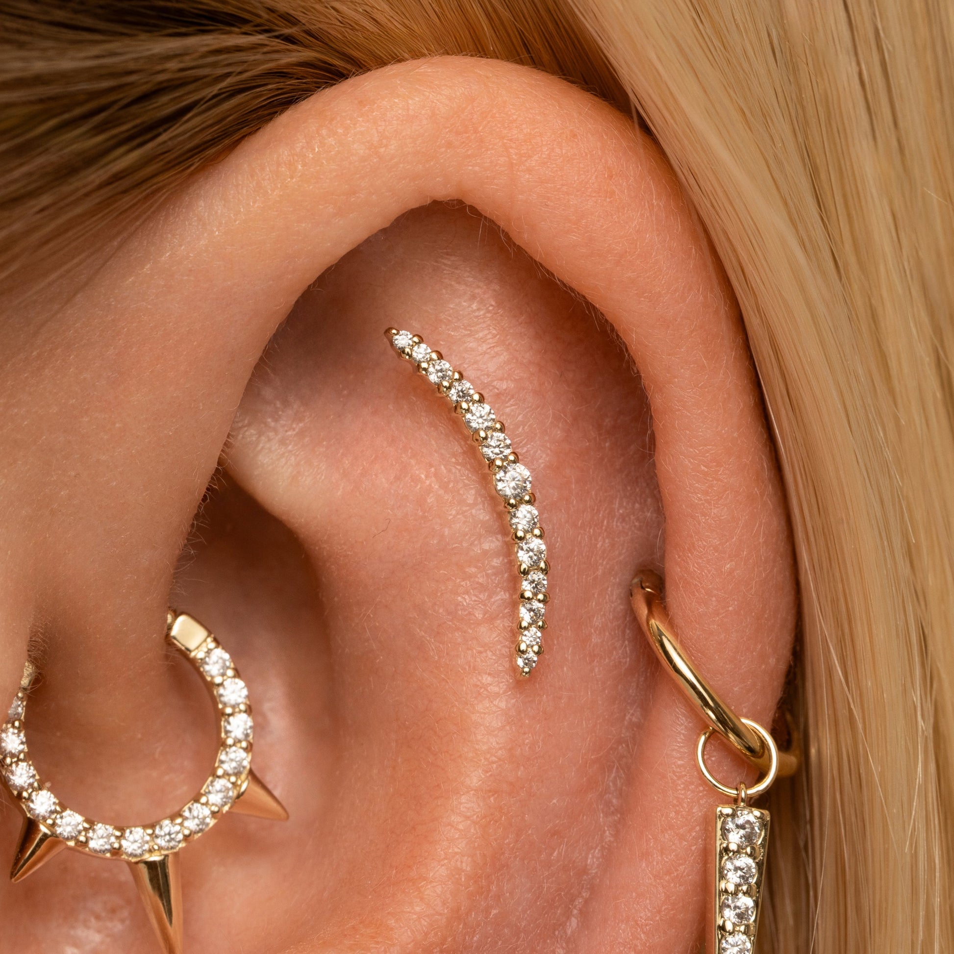 Laura Bond Jewellery 9k solid yellow gold Aurora curved flat back labret stud earring Cartilage Studs