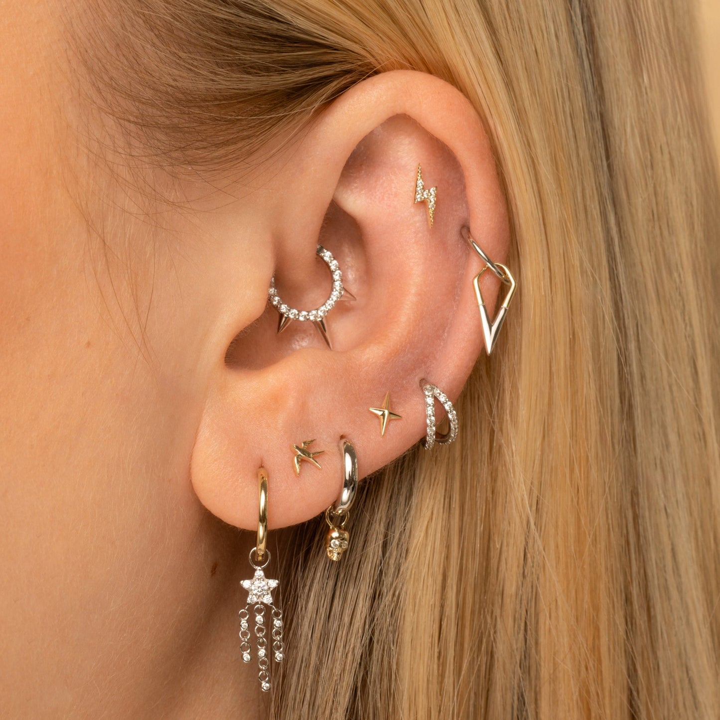 Laura Bond Jewellery Bold and Gold Edinburgh 14k solid yellow gold swallow flat back labret stud earring Cartilage Studs