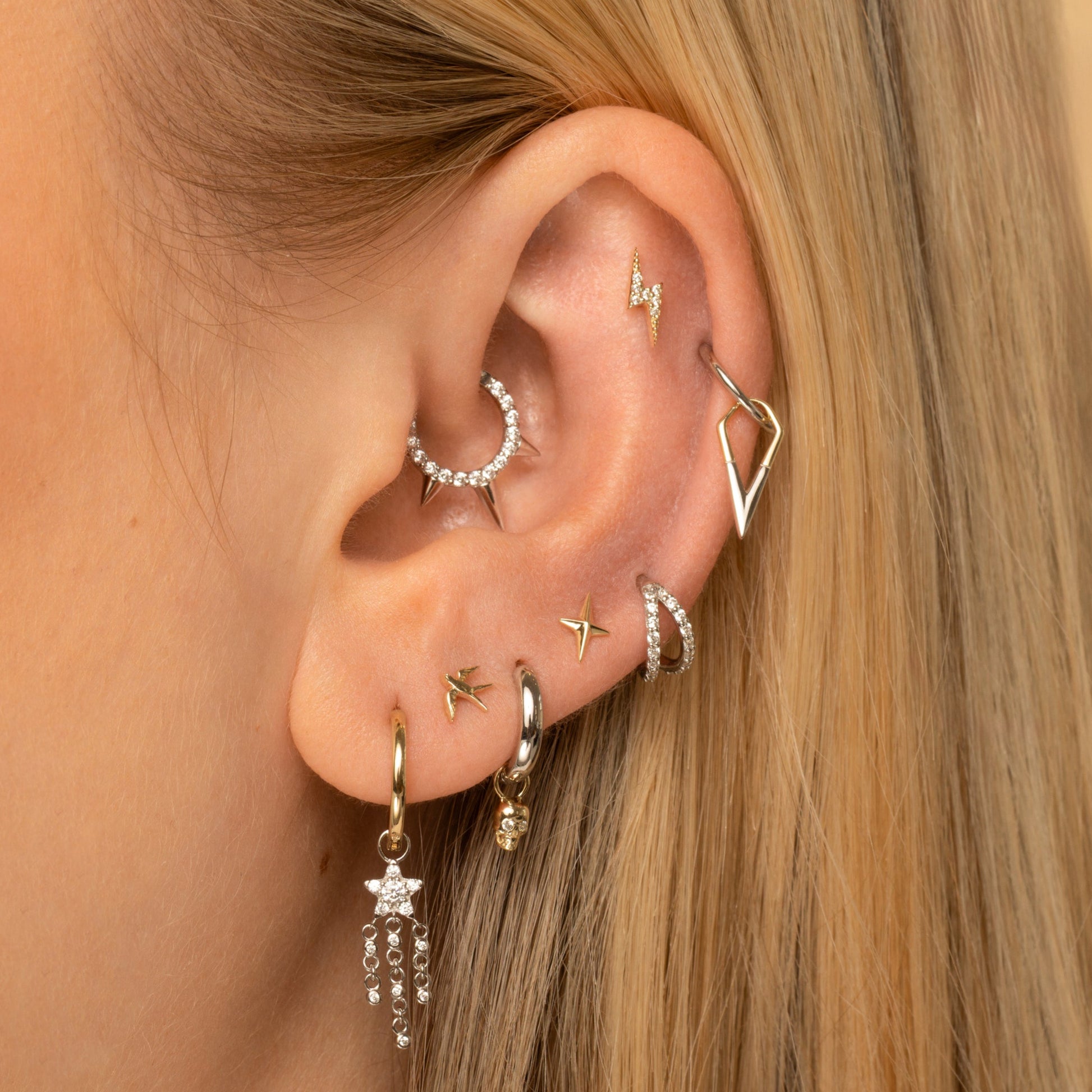 Laura Bond Jewellery Bold and Gold Edinburgh 14k solid yellow gold swallow flat back labret stud earring Cartilage Studs