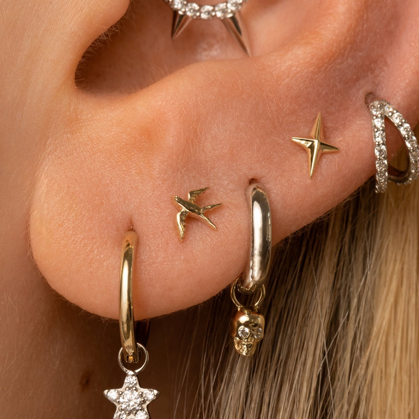 Laura Bond Jewellery Bold and Gold Edinburgh 14k solid yellow gold swallow flat back labret stud earring Cartilage Studs