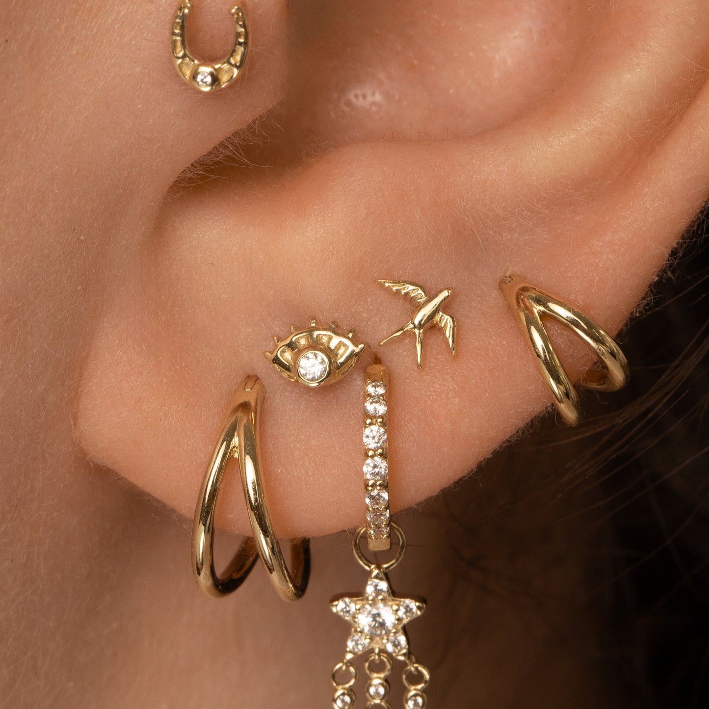 Laura Bond Jewellery Bold and Gold Edinburgh 14k solid yellow gold swallow flat back labret stud earring Cartilage Studs