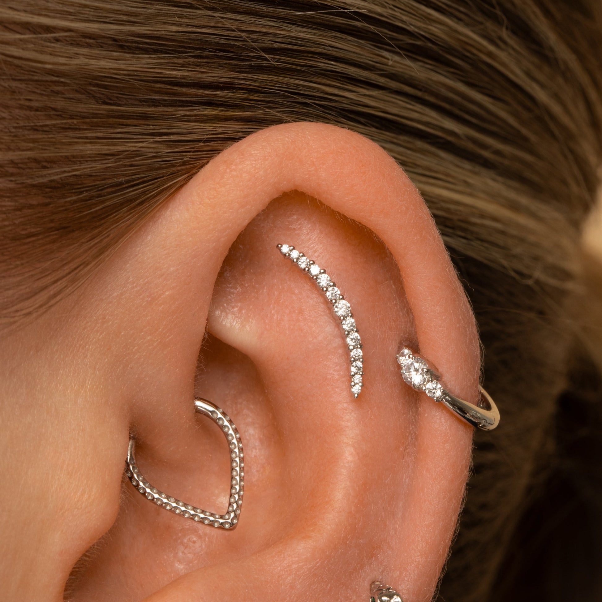 Laura Bond Jewellery 14k solid white gold Aurora curved flat back labret stud earring Cartilage Studs