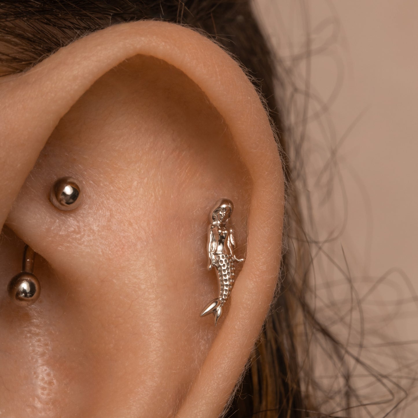 Laura Bond Jewellery Bold and Gold Edinburgh 14k solid white gold mermaid flat back labret stud earring 8mm (left) Cartilage Studs