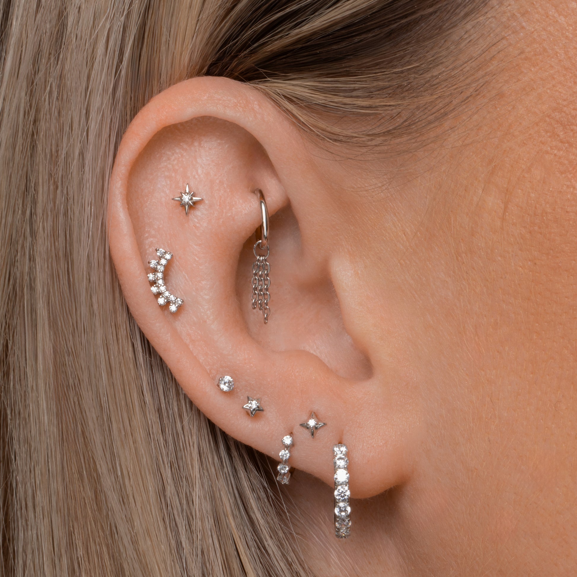 Laura Bond Jewellery 9k solid white gold four-stone crystal teeny tiny huggie earring Huggies and Hoops