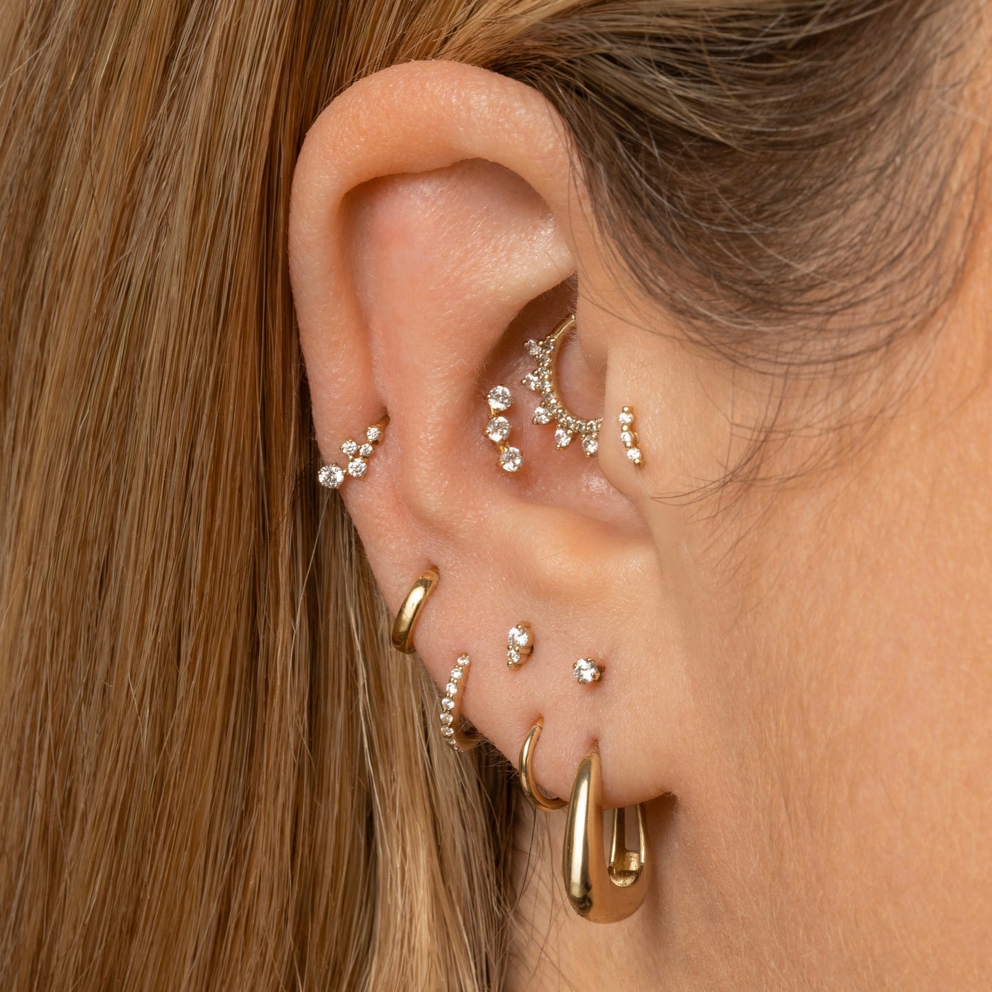 Laura Bond Jewellery Bold and Gold Edinburgh 9k solid yellow gold constellation mini huggie earring Huggies and Hoops