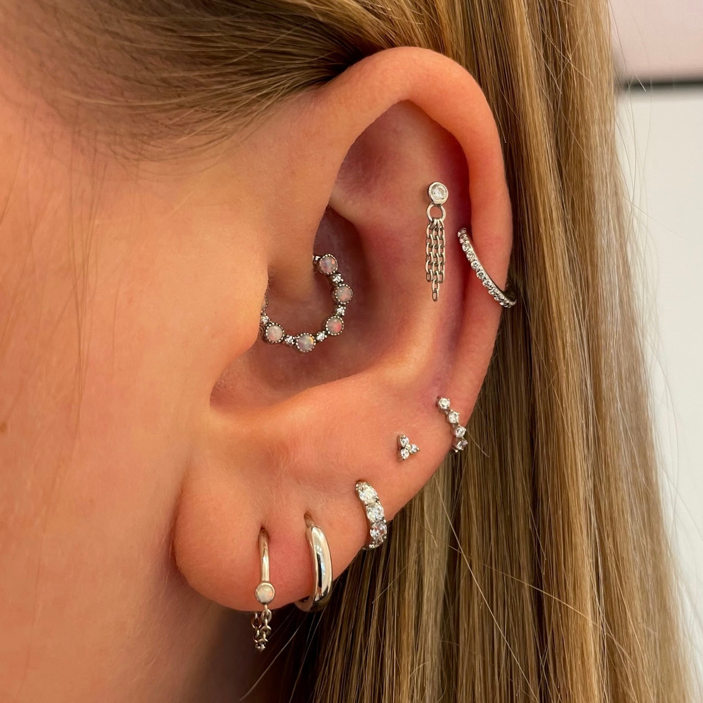 Laura Bond Jewellery 9k solid white gold four-stone crystal teeny tiny huggie earring Huggies and Hoops