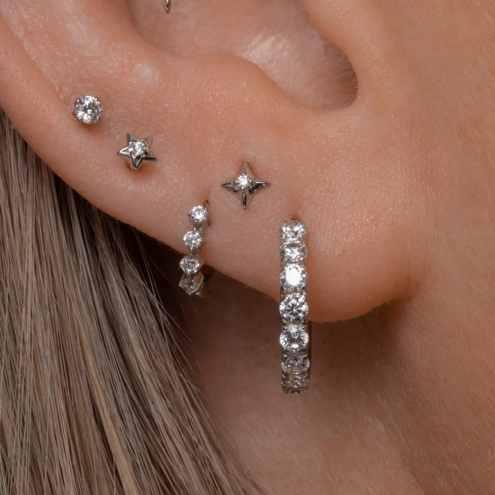 Laura Bond Jewellery 9k solid white gold four-stone crystal teeny tiny huggie earring Huggies and Hoops
