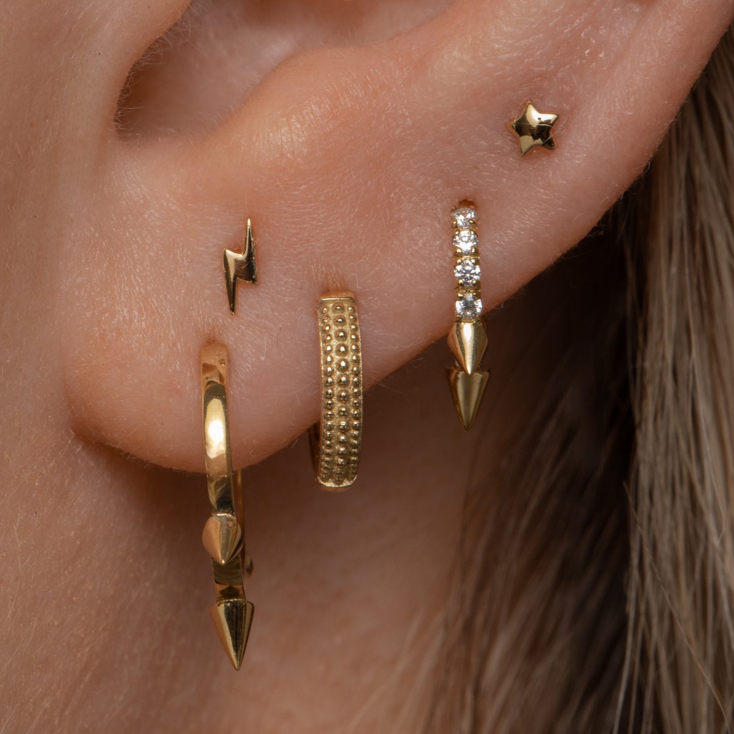 Laura Bond Jewellery Bold and Gold Edinburgh 9k solid yellow 6mm mini crystal spike huggie earring Huggies and Hoops