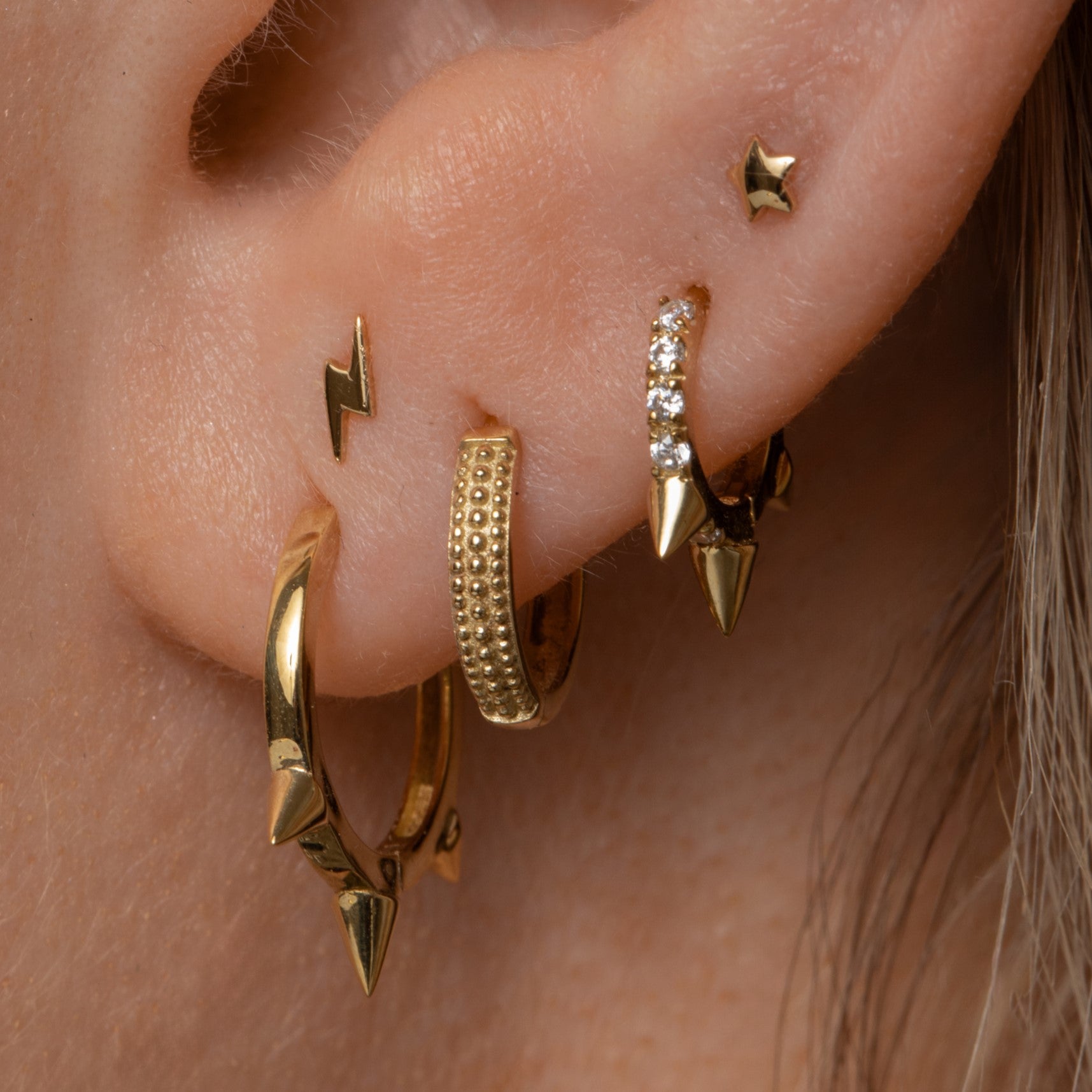 Laura Bond Jewellery Bold and Gold Edinburgh 9k solid yellow 6mm mini crystal spike huggie earring Huggies and Hoops