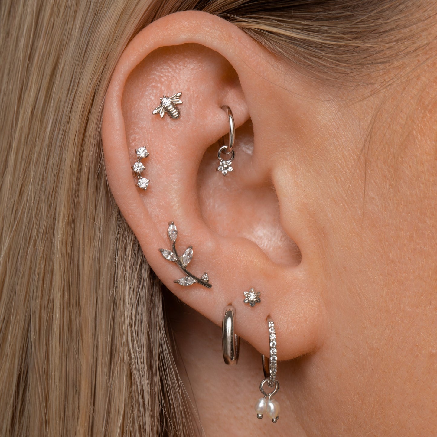 Laura Bond Jewellery Bold and Gold Edinburgh 14k solid white gold Forget Me Not tiny flower flat back labret stud earring 8mm Cartilage Studs