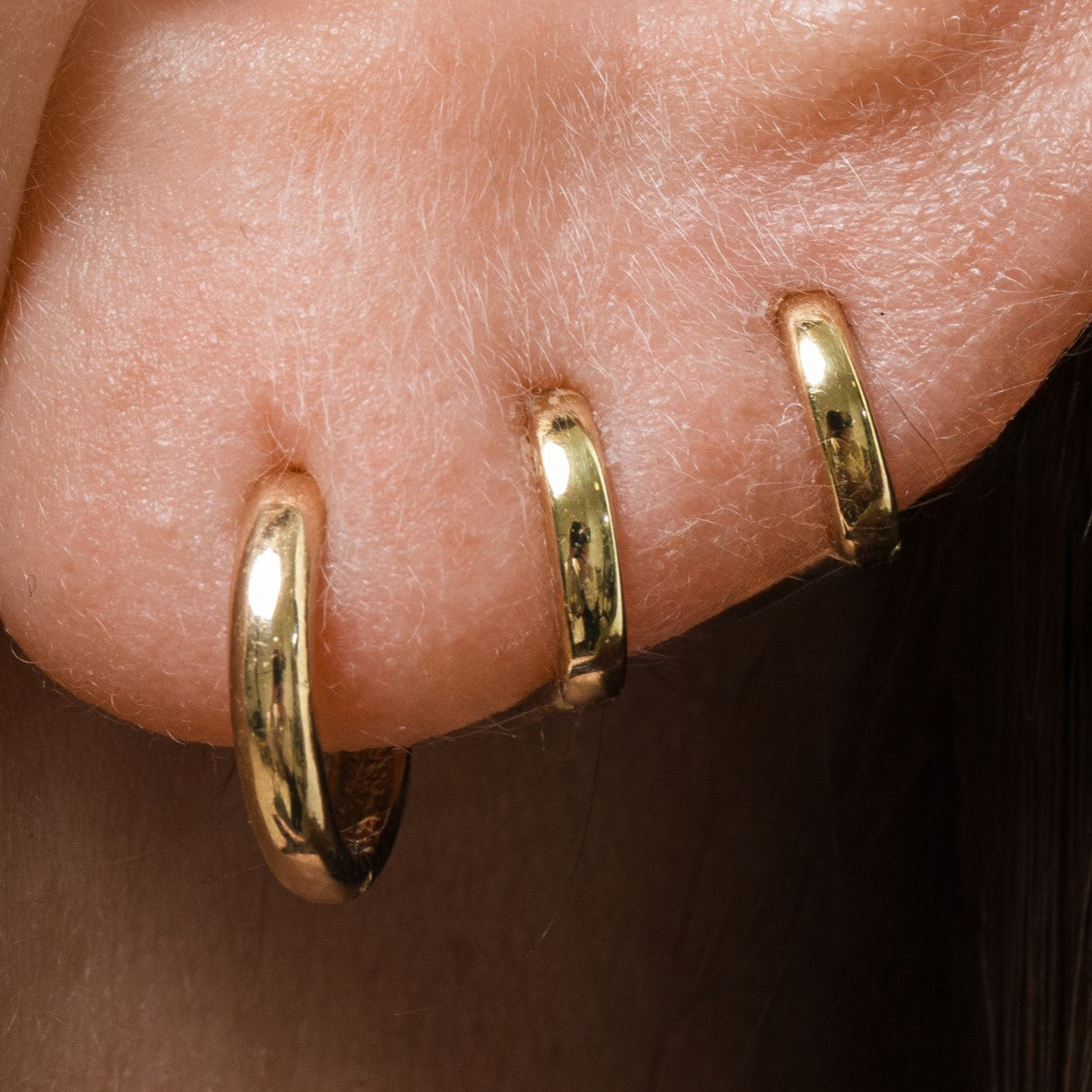 Laura Bond Jewellery Bold and Gold Edinburgh 9k solid yellow gold 8.5mm simple huggie earring Huggies and Hoops