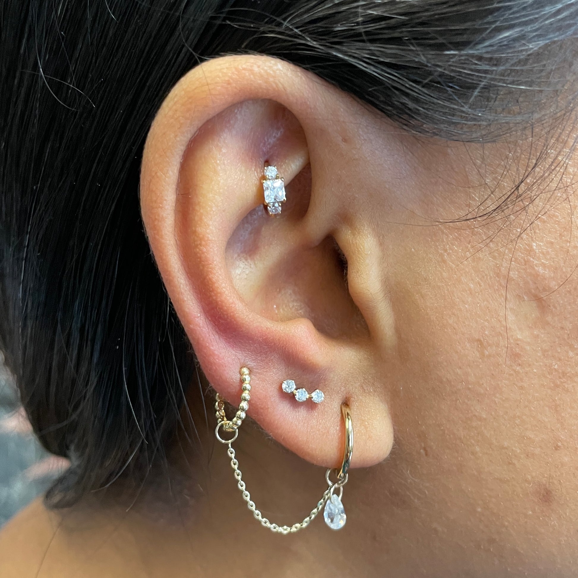 Laura Bond Jewellery Bold and Gold Edinburgh 9k solid yellow gold 10mm slim simple huggie earring Huggies and Hoops