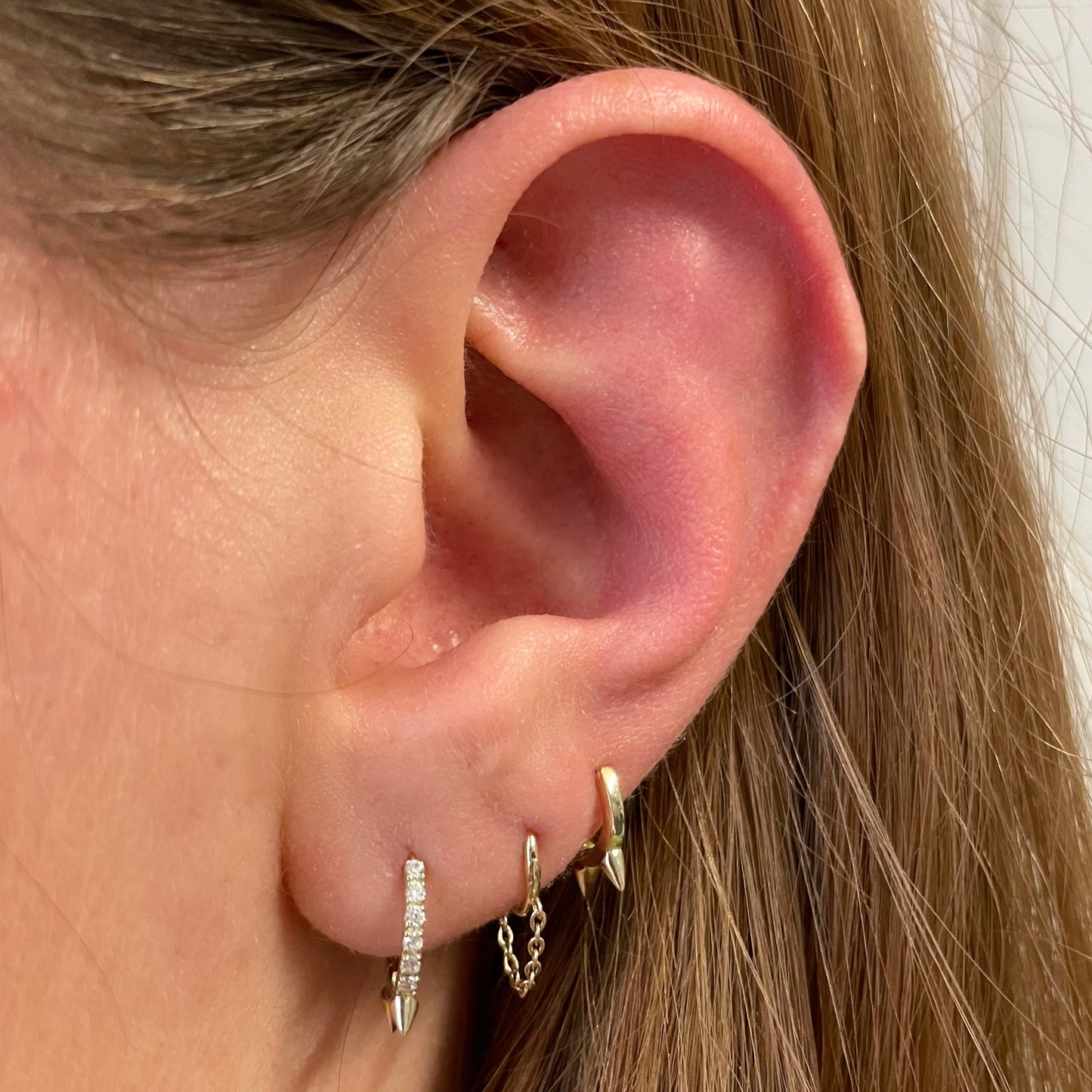 Laura Bond Jewellery Bold and Gold Edinburgh 9k solid yellow gold 6mm mini plain spike huggie earring Huggies and Hoops